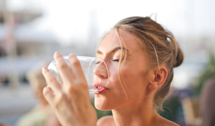 How much water should I drink while taking water pills?