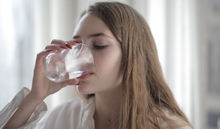 How much water should I drink while taking water pills?